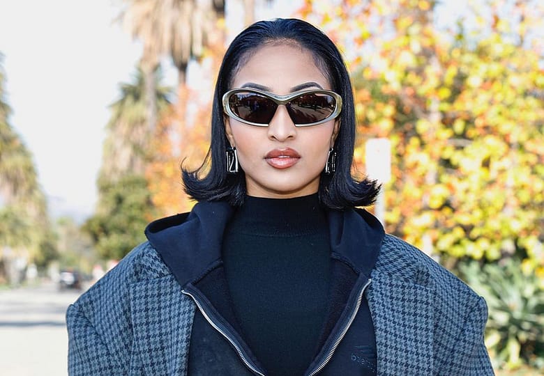 shenseea-stands-out-in-trench-coat,-fishnet-leggings-at-balenciaga’s-pre-fall-2024-show