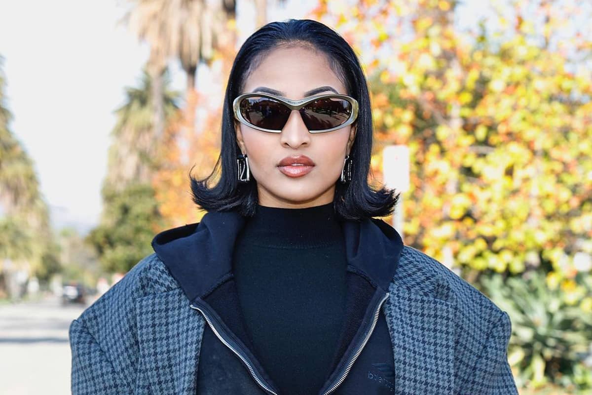 shenseea-stands-out-in-trench-coat,-fishnet-leggings-at-balenciaga’s-pre-fall-2024-show